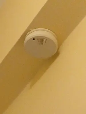 a ceiling with a white ceiling fan in a room at Athens Panormou station in Athens