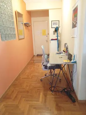 an office with a desk and a chair in a room at Athens Panormou station in Athens