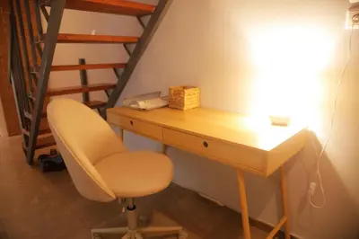 a desk with a chair and a lamp at Maisonette Chalandri by DV10 Family House Luxury Oasis in Athens