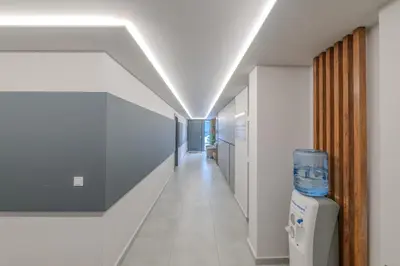 a hallway of a hospital with a hallway at Saint Mykonos Apartment in Piraeus