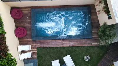 an aerial view of a swimming pool in a house at Lida Garden Loft in Anavissos