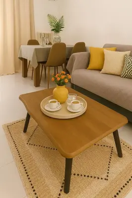 a living room with a coffee table and a couch at Central, Quiet & Comfortable Apartment in Athens