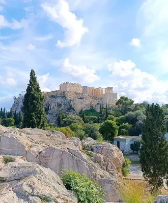 a view of the acropolis from atop a rocky mountain at Kalliopi Studio in Athens
