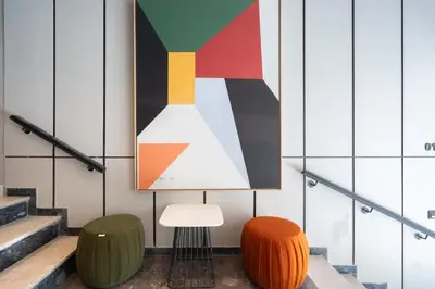 a room with twoools and a painting on the wall at Modern 2BR with Rooftop Jacuzzi & Sauna Access in Athens