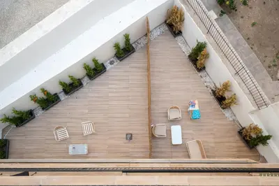 an overhead view of a staircase in a building at 2BR Apt Access To Rooftop with Sauna & Jacuzzi in Athens