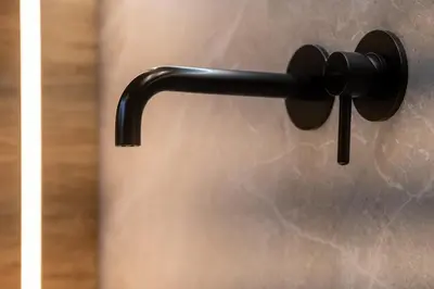 a black door handle on a metal door at Azure7 Seaside - Luxury Apartment in Varkiza in Varkiza