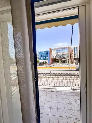 a view of a city from a window at The North Nest in Athens