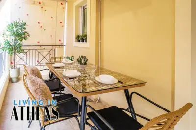 a dining room with a table and chairs at Athenian Exclusive residence 2&2 ppl in Athens