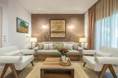a living room with a couch and a table at Crown Design Apt - Acropolis in Athens