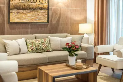 a living room with a couch and a table at Crown Design Apt - Acropolis in Athens