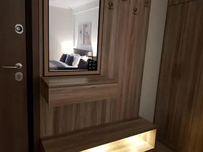 a mirror on the door of a room with a bed at JASMIN Luxury Apartment in Athens