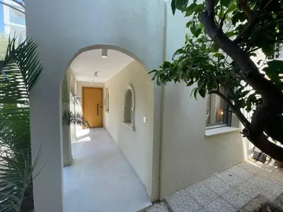 an archway leading to a hallway in a house at Voula Olive Garden by Taurus in Athens