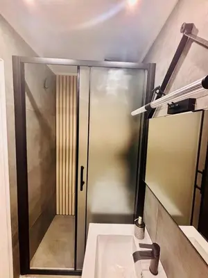 a bathroom with a sink and a mirror at Monastiraki 110 SuperHost Hub in Athens