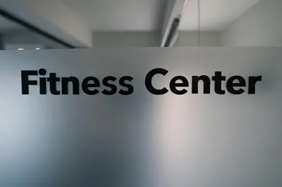 a sign with the words fitness center on a wall at Skyline Spa Athens 130 A in Athens