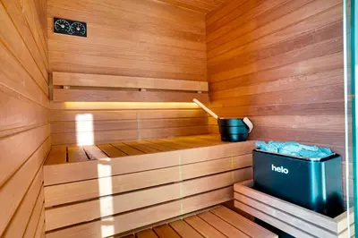 a sauna with a trash can in the middle at Skyline Spa Athens 001 in Athens