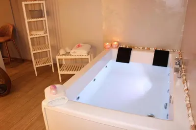 a bathroom with a bath tub in a room at VIP Suite 108 - Castle De Paris in Athens