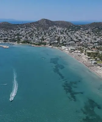 an aerial view of a beach and a city at Saronic retreat Varkiza in Vari