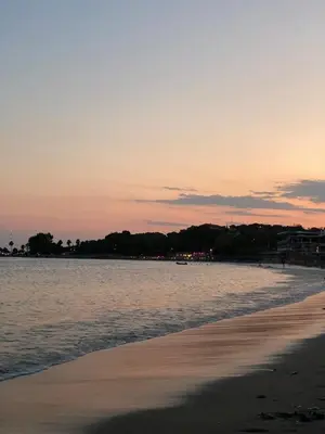 a view of the beach at sunset at Loft apartment by the sea in Athens