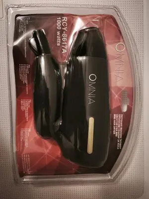 a plastic container with a toothbrush in a package at Flya House in Athens