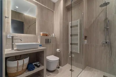 a bathroom with a shower and a sink and a toilet at Urban Nest 1 in Athens