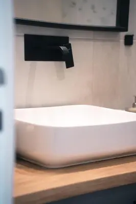 a white sink on a counter in a bathroom at Relax in Style Petralona Modern Flat in Athens