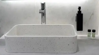 a white sink with a faucet in a bathroom at Cozy Loft Monastiraki in Athens