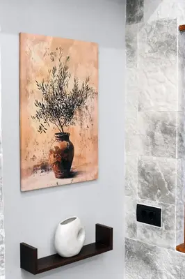 a painting of a vase on a wall at Cozy Loft Monastiraki in Athens