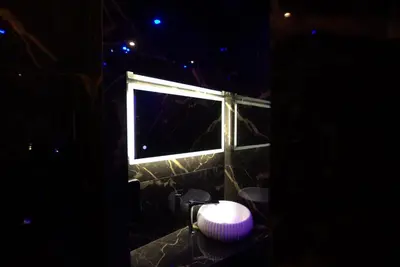 a bathroom with a window in a dark room at Deluxe Suite 212 - Castle De Paris in Athens