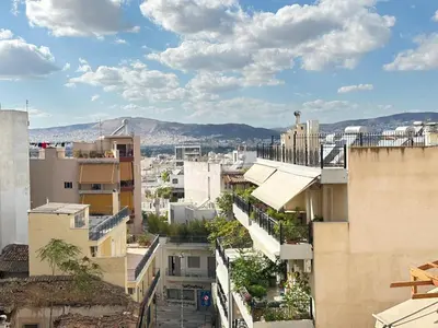 a view of a city from a building at 4th Floor Bright 2BR Retreat Near Acropolis in Athens