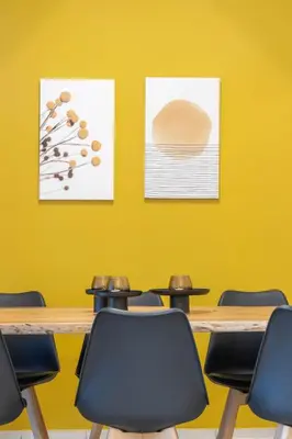 a conference room with a wooden table and chairs at Acropolis Canvas-3BDR in Athens