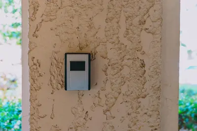a wall with a box on the side of a building at Modern 2BR Apt Glyfada Center and Private Veranda in Athens