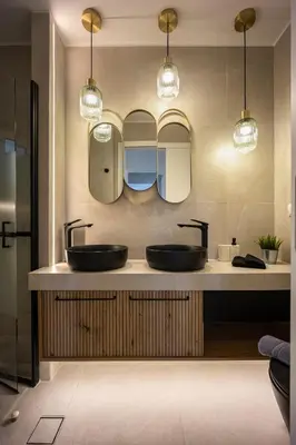 a bathroom with two sinks and two mirrors at Athens Nala in Athens