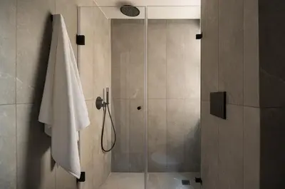 a bathroom with a shower with a glass door at P28 Suite 103 in Athens