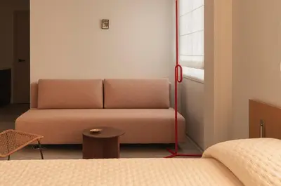 a living room with a couch and a table at P28 Suite 109 in Athens