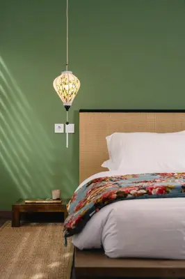 a bedroom with a bed and a chandelier at Athens Heart Urban Zen Loft in Athens