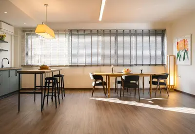 a kitchen and dining room with a table and chairs at Athens Heart Urban Zen Loft in Athens