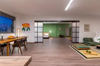 a living room with a table and a dining room at Athens Heart Urban Zen Loft in Athens