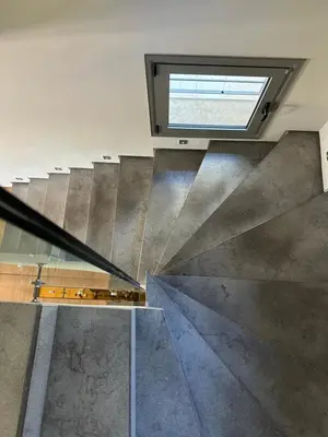 an overhead view of a metal staircase with a window at BonVilla Seaview Oasis in Anavissos