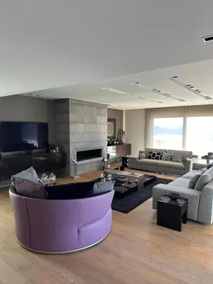 a large living room with a large purple couch at BonVilla Seaview Oasis in Anavissos