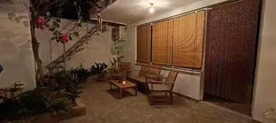 a room with two chairs and a table and a window at CityZen Apartment in Athens