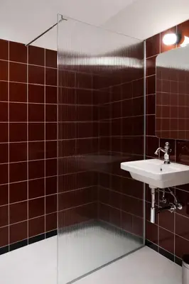 a bathroom with a sink and a mirror at Atla Living Athens in Athens
