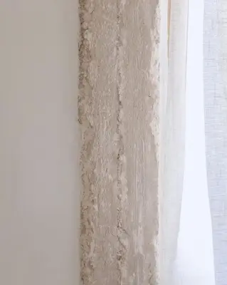 a curtain hanging on a wall next to a window at Atla Living Athens in Athens