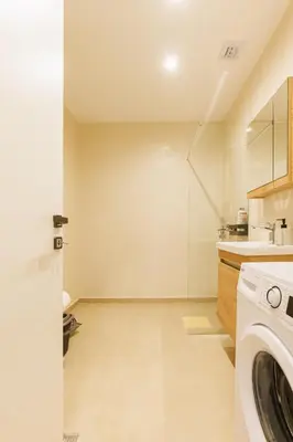 a laundry room with a washer and dryer at Charming 1BR Studio in the Heart of Athens in Athens