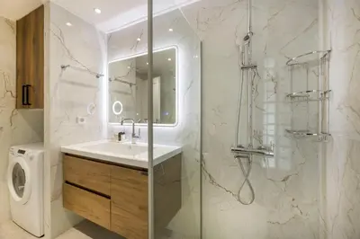 a bathroom with a sink and a shower at Calming 1BR Apartment with Acropolis view in Athens