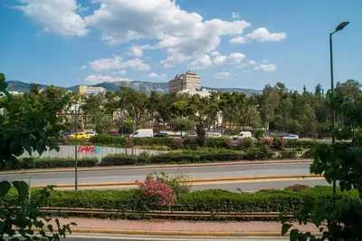 a view of a street with a building in the background at Filoxenia MG Projects-City Living Metro in Athens