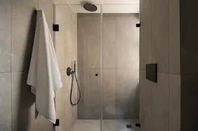 a bathroom with a shower with a glass door at P28 Suite 106 in Athens