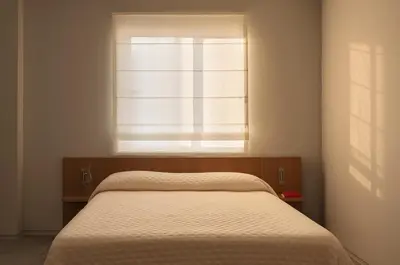 a bedroom with a bed and a window at P28 Suite 107 in Athens
