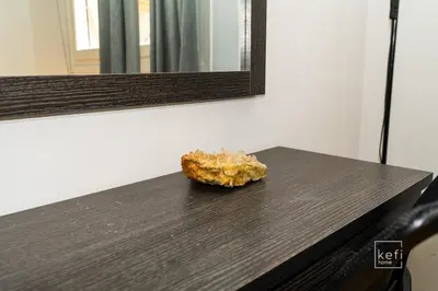 a piece of food sitting on top of a table at Cozy 3-BDR Flat at Tavros Metro - 10 Min to Center in Athens