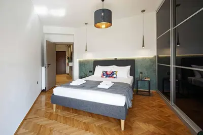 a bedroom with a large bed in a room at Polis luxury apartment 2 in Athens