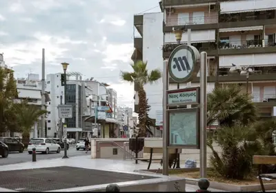 a sign for a tube pharmacy on a city street at Polis luxury apartment 2 in Athens